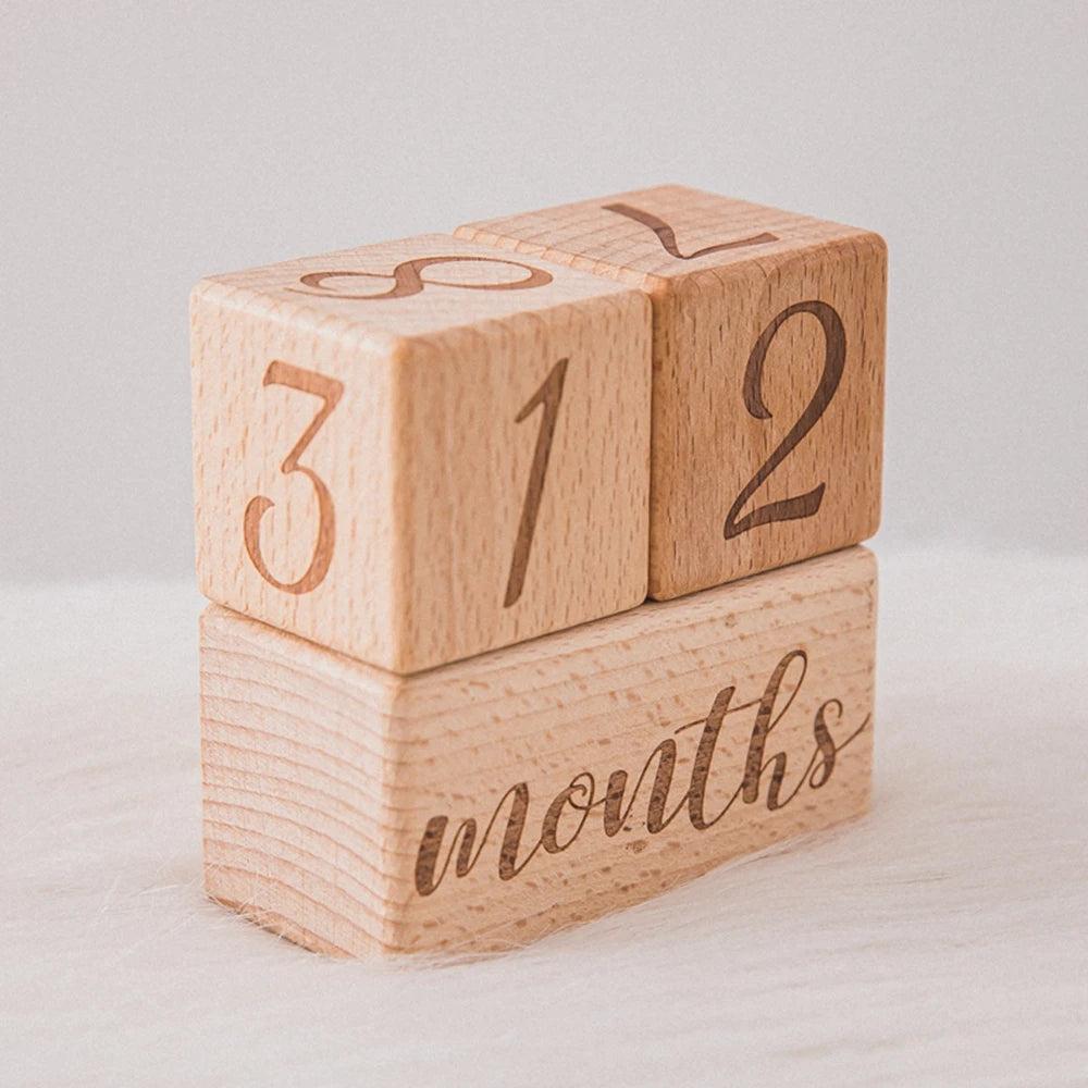 3-piece set of raw wood baby month milestone cards, featuring engraved beech block squares for newborn monthly birthday milestones, perfect as photography props.